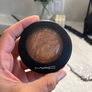 MAC gold deposit bronzer